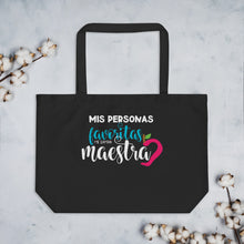 Load image into Gallery viewer, Mis personas favoritas me llaman maestra tote bag
